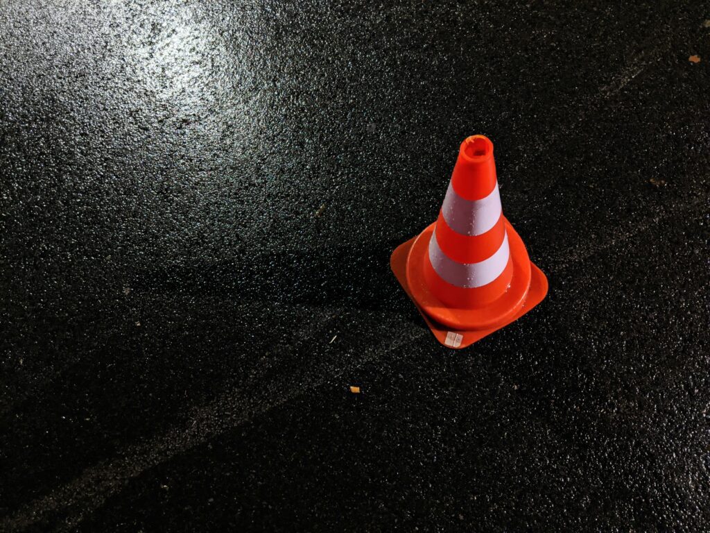 orange cone on the road