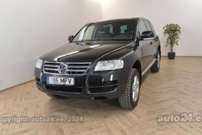 Купить б.у Volkswagen Touareg Highline 2.5 128 kW 2006 цвет черный года в Таллине